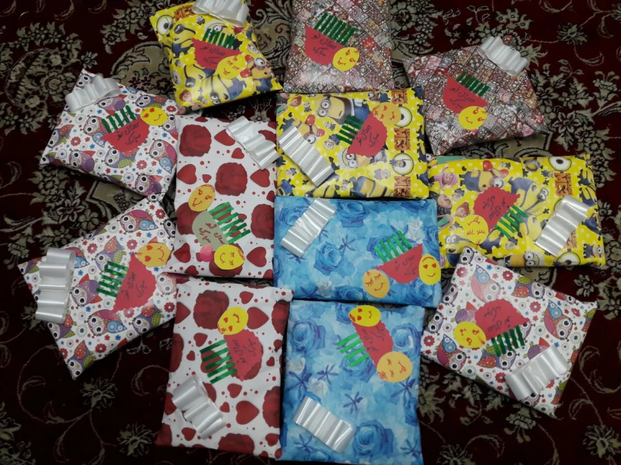 تهیه و توزیع لباس و کفش بین دختران بی سرپرست و بدسرپرست از طریق کمپین دانشجویی «دستان مهربانی» 4