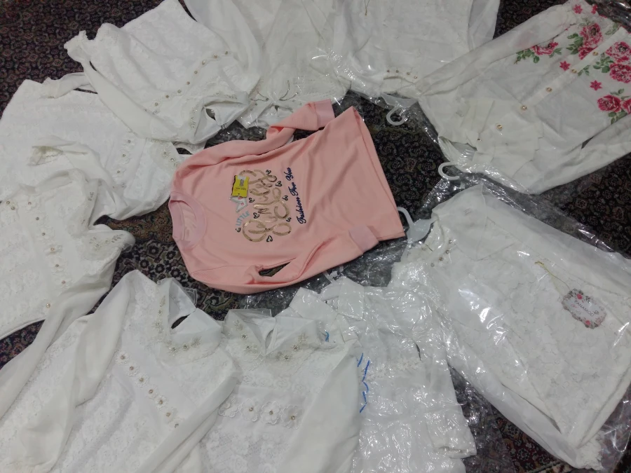 تهیه و توزیع لباس و کفش بین دختران بی سرپرست و بدسرپرست از طریق کمپین دانشجویی «دستان مهربانی» 5