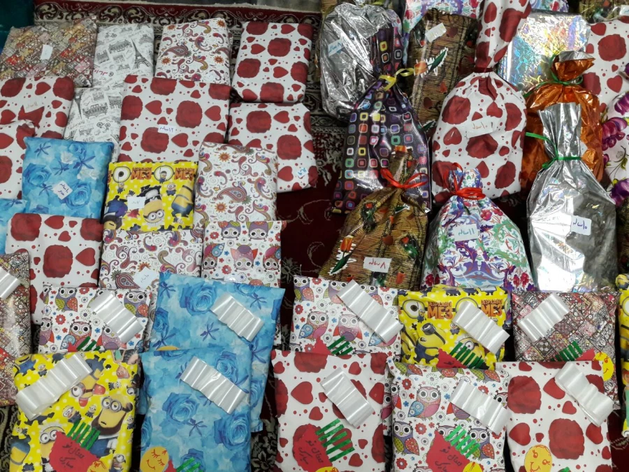 تهیه و توزیع لباس و کفش بین دختران بی سرپرست و بدسرپرست از طریق کمپین دانشجویی «دستان مهربانی» 8